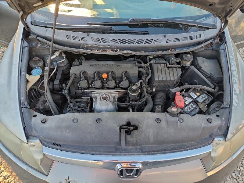 Photo 11 from auction – 2006 HONDA CIVIC LX with VIN 2HGFA165X6H516307