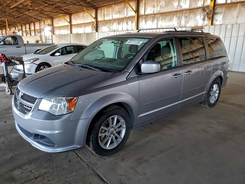 DODGE GRAND CARA 2016 con VIN 2C4RDGCG8GR319045 - Foto de la subasta