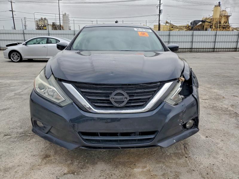 Photo 5 from auction – 2017 NISSAN ALTIMA 2.5 with VIN 1N4AL3AP4HC271426