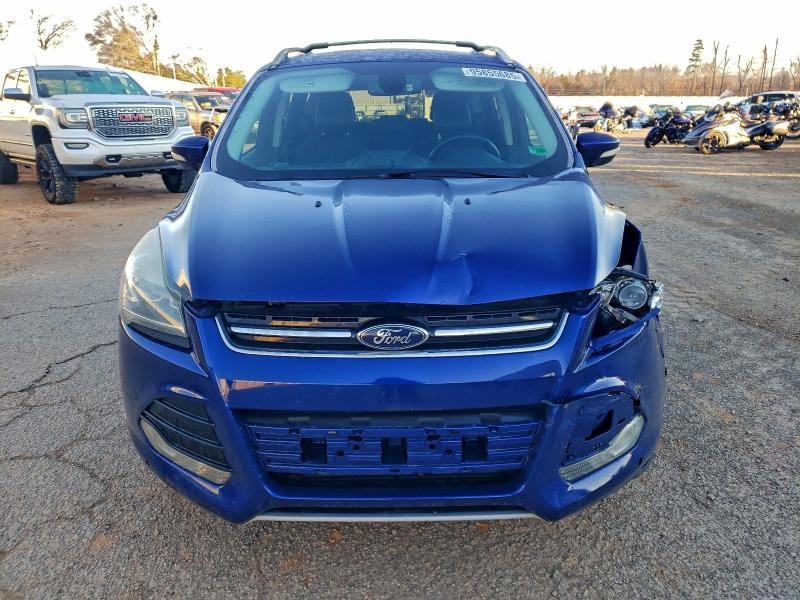 Foto 5 de la subasta – 2014 FORD ESCAPE TIT con VIN 1FMCU9J97EUB25253