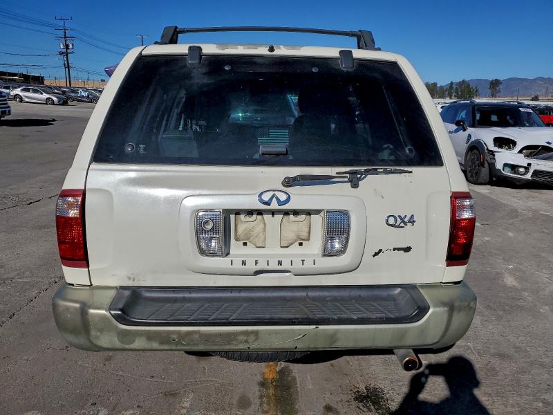Photo 6 from auction – 2003 INFINITI QX4 with VIN JNRDR09X03W251254