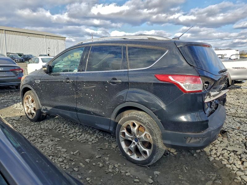 Photo 2 from auction – 2014 FORD ESCAPE TIT with VIN 1FMCU9J93EUA02520