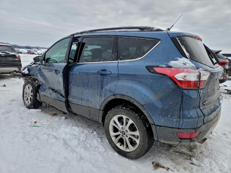 Photo 2 from auction – 2018 FORD ESCAPE SE with VIN 1FMCU9GD6JUC05102