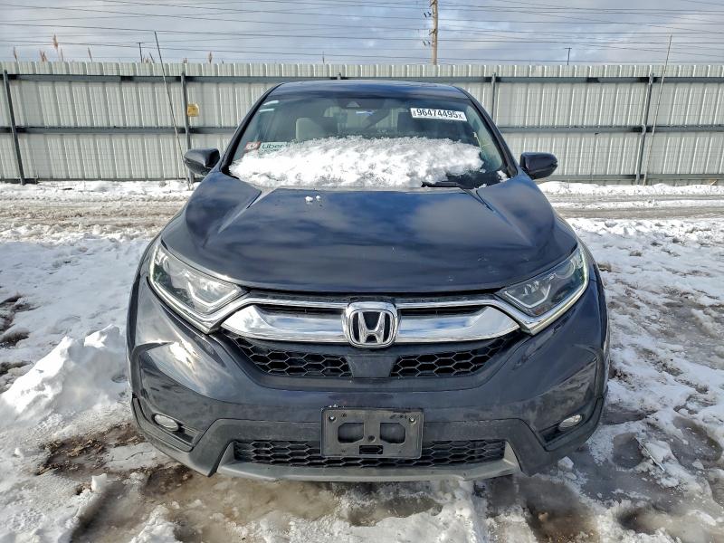 Photo 5 from auction – 2019 HONDA CR-V with VIN 5J6RW2H53KL015699