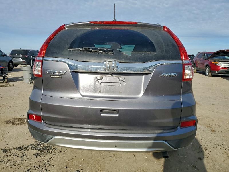 Photo 6 from auction – 2015 HONDA CR-V EXL with VIN 2HKRM4H72FH650593