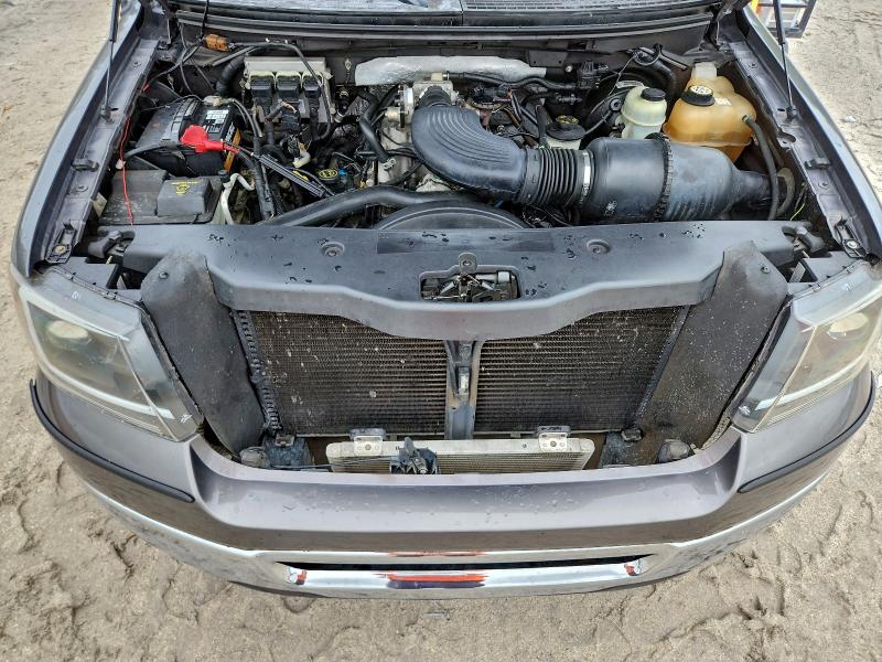 Photo 11 from auction – 2006 FORD F150 with VIN 1FTRF12W16NA79428