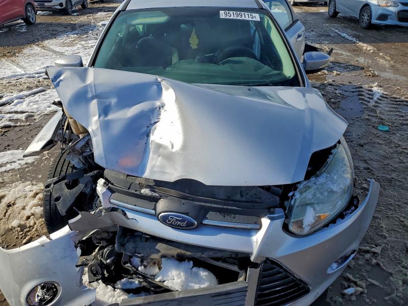 Photo 11 from auction – 2013 FORD FOCUS SE with VIN 1FADP3F21DL337438