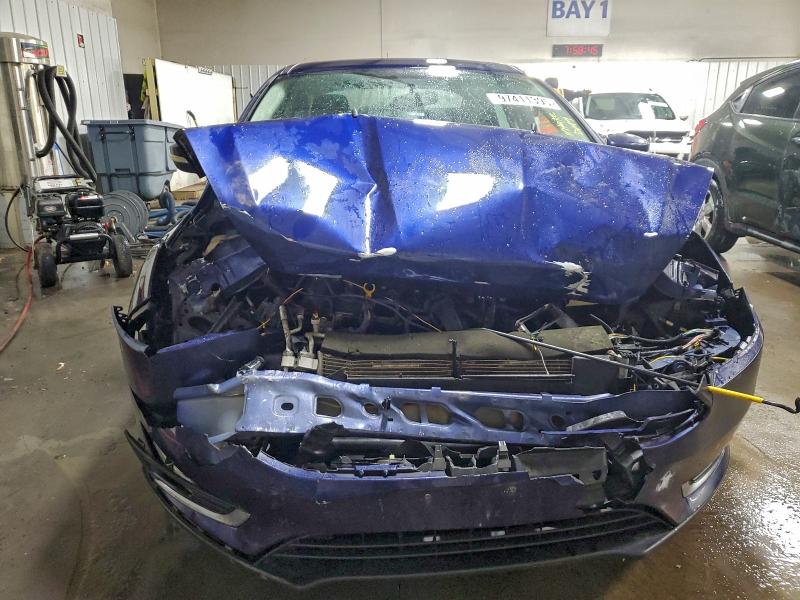 Photo 5 from auction – 2016 FORD FOCUS with VIN 1FADP3J20GL211311