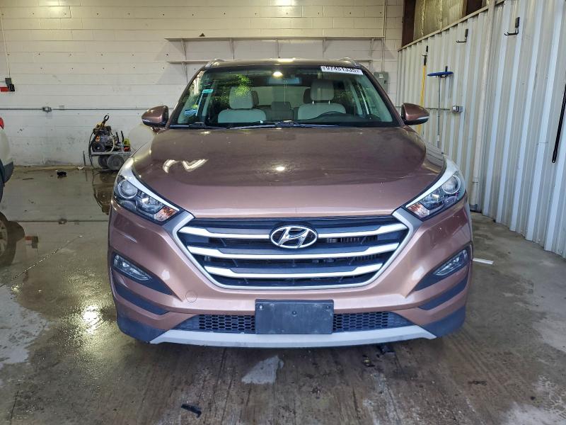 Photo 5 from auction – 2017 HYUNDAI TUCSON LIM with VIN KM8J3CA21HU310283