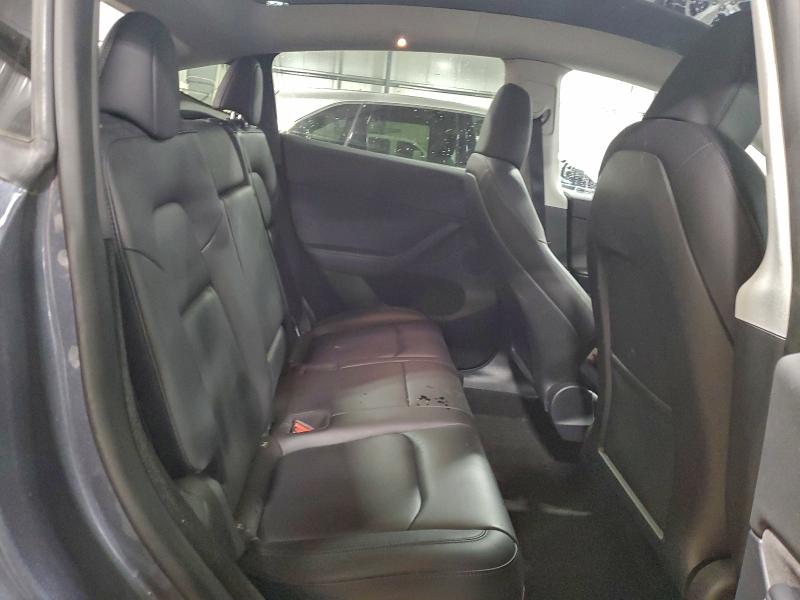 Photo 11 from auction – 2022 TESLA MODEL Y with VIN 7SAYGDEE6NA019073