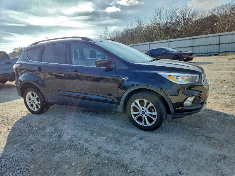 Photo 4 from auction – 2018 FORD ESCAPE SE with VIN 1FMCU0GD8JUA97285