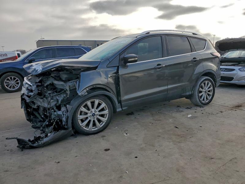 FORD ESCAPE TIT 2017 with VIN 1FMCU0JD6HUE72030 - Photo from auction