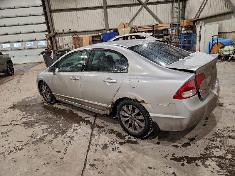 Photo 2 from auction – 2010 HONDA CIVIC EXL with VIN 2HGFA1F02AH013643