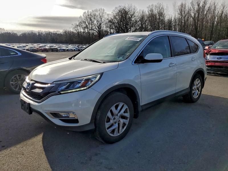 Photo 1 from auction – 2015 HONDA CR-V EXL with VIN 5J6RM4H77FL005475