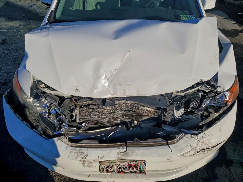 Photo 11 from auction – 2012 HONDA CIVIC LX with VIN 19XFB2F52CE022287