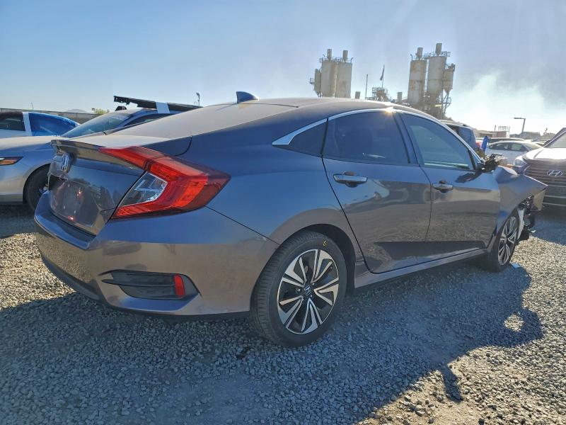 Photo 3 from auction – 2016 HONDA CIVIC with VIN 19XFC1F77GE210396