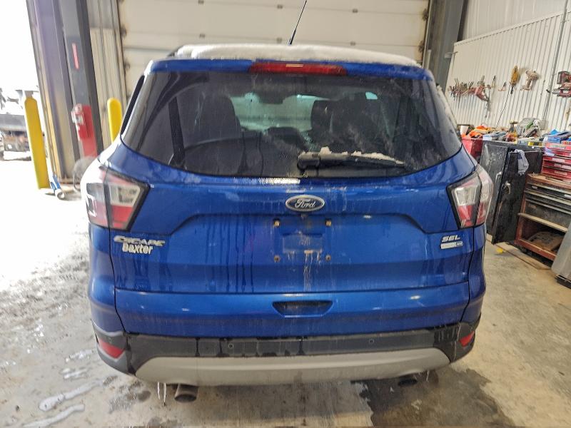 Photo 6 from auction – 2018 FORD ESCAPE with VIN 1FMCU9HD7JUB86705