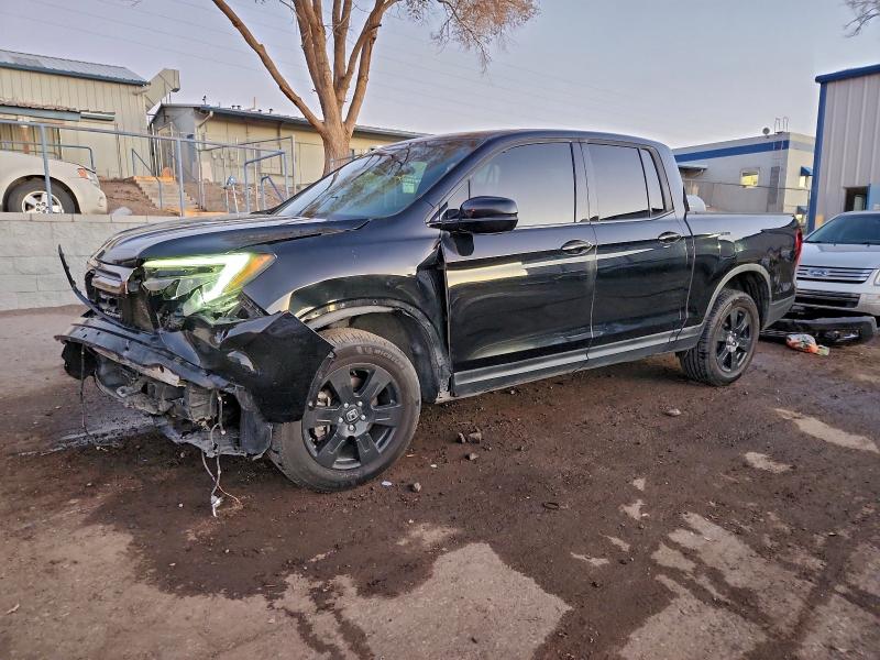 HONDA RIDGELINE 2017 with VIN 5FPYK3F8XHB036990 - Photo from auction