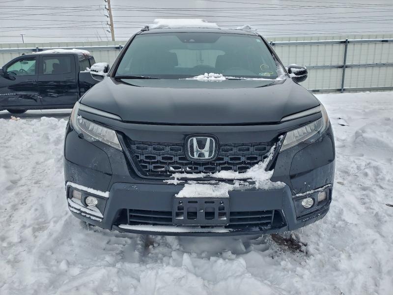Photo 5 from auction – 2021 HONDA PASSPORT E with VIN 5FNYF8H09MB008271