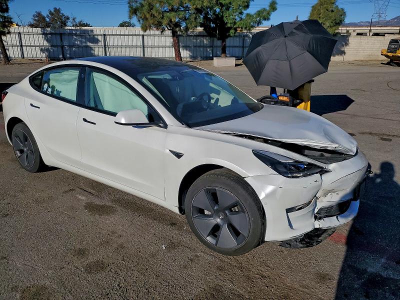Photo 4 from auction – 2022 TESLA MODEL 3 with VIN 5YJ3E1EA3NF115450
