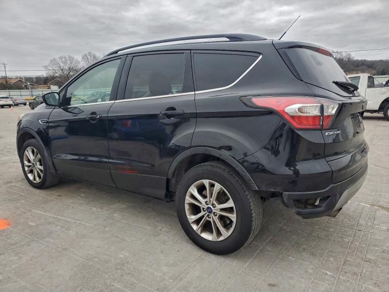 Photo 2 from auction – 2017 FORD ESCAPE SE with VIN 1FMCU0G99HUA85068