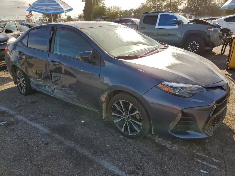 Photo 4 from auction – 2017 TOYOTA COROLLA with VIN 5YFBURHE6HP646064