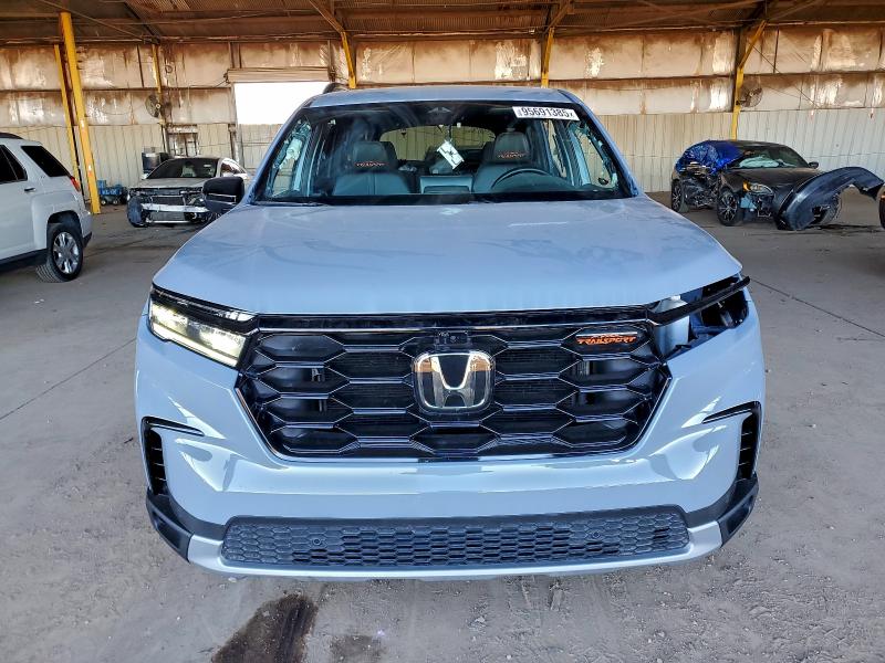 Photo 5 from auction – 2023 HONDA PILOT TRAI with VIN 5FNYG1H65PB012489