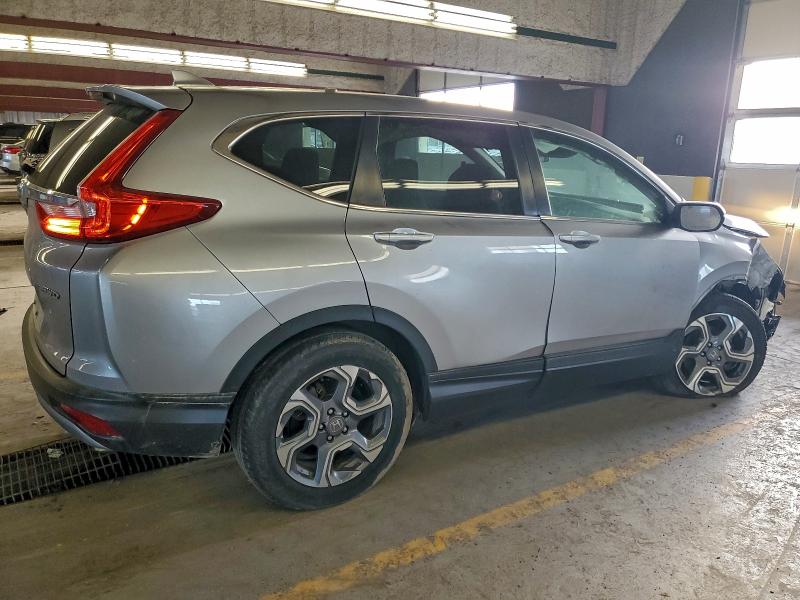 Photo 3 from auction – 2019 HONDA CR-V with VIN 2HKRW2H57KH638849
