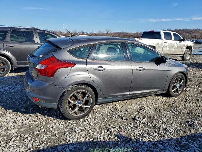 Foto 3 de la subasta – 2013 FORD FOCUS SE con VIN 1FADP3K20DL215904