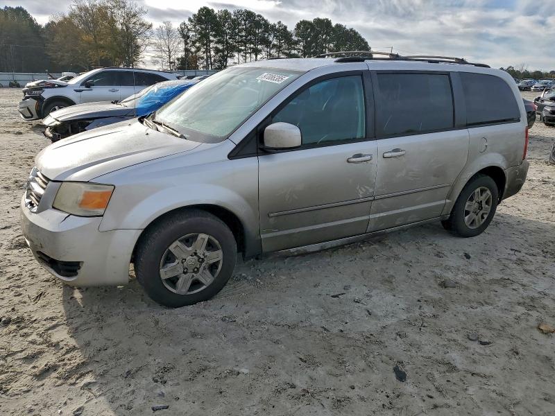 DODGE GRAND CARA 2010 with VIN 2D4RN5D18AR165300 - Photo from auction