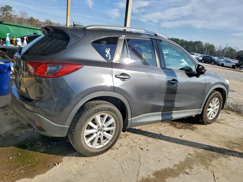 Photo 3 from auction – 2014 MAZDA CX-5 TOURI with VIN JM3KE2CY5E0319352