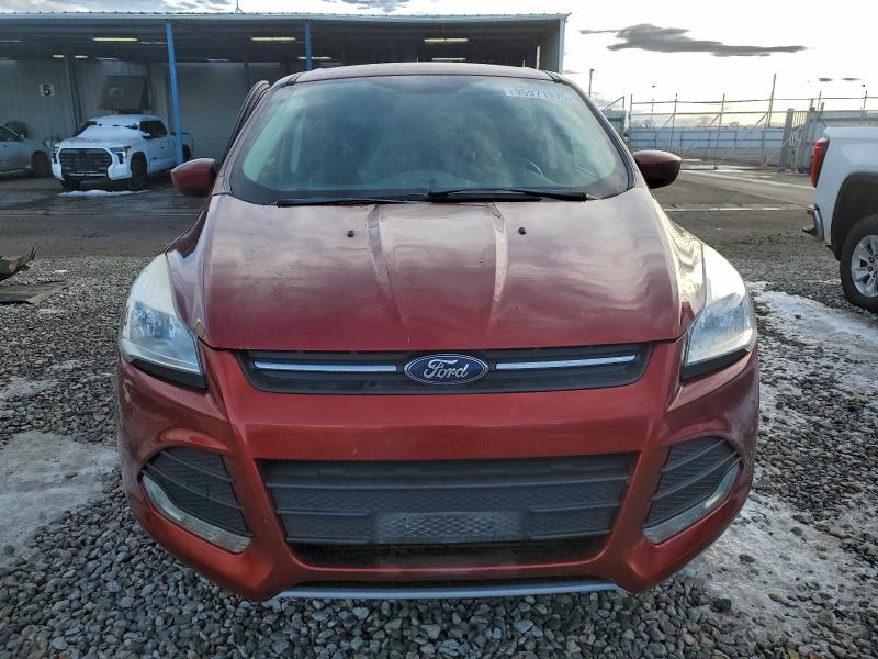 Photo 5 from auction – 2016 FORD ESCAPE SE with VIN 1FMCU9G98GUB22386