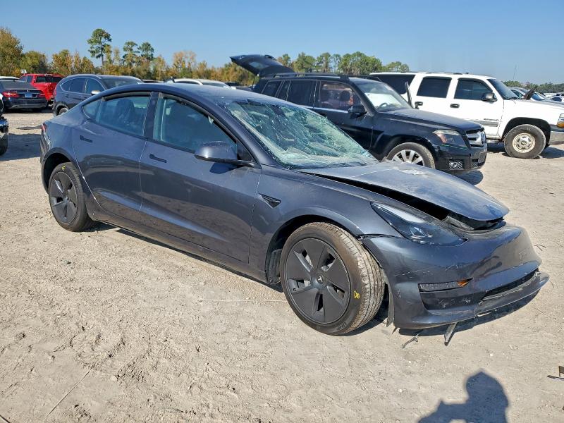 Photo 4 from auction – 2023 TESLA MODEL 3 with VIN 5YJ3E1EA2PF696264