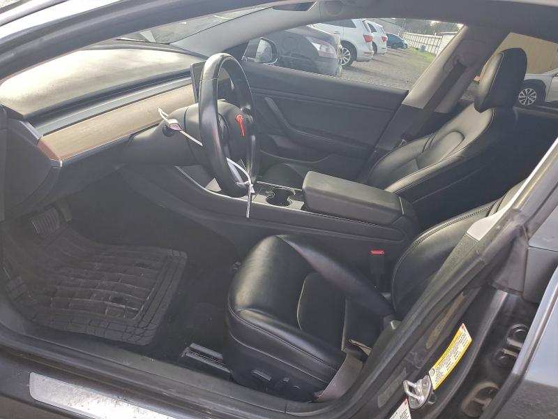 Photo 7 from auction – 2018 TESLA MODEL 3 with VIN 5YJ3E1EA9JF050890