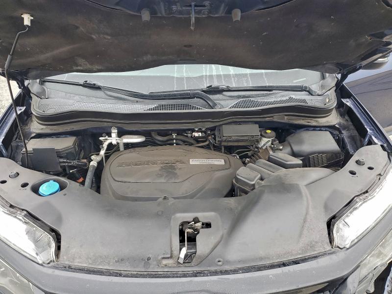 Photo 11 from auction – 2020 HONDA PASSPORT E with VIN 5FNYF7H54LB001233