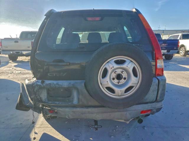 Photo 6 from auction – 2002 HONDA CR-V with VIN JHLRD68412C016959