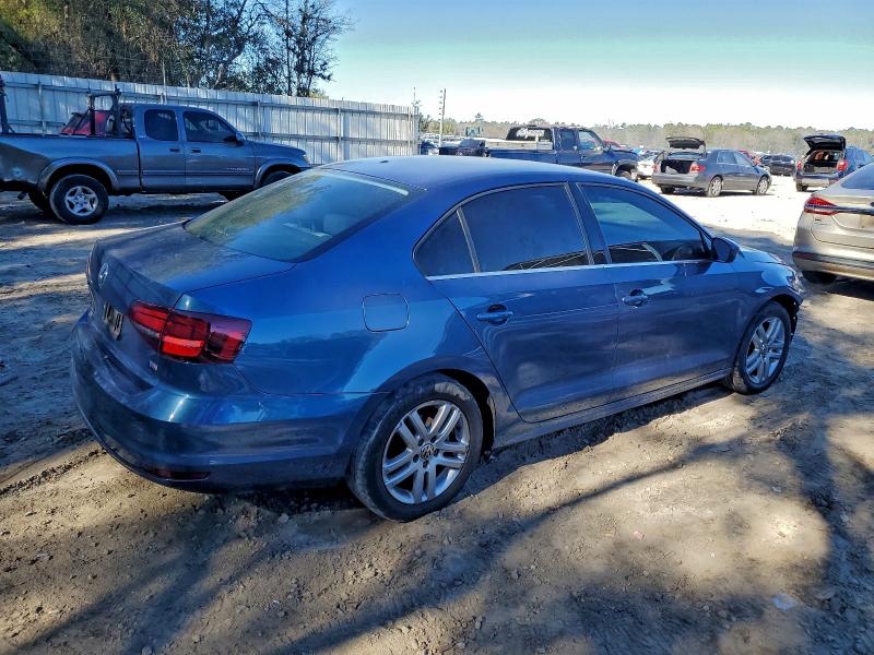 Photo 3 from auction – 2017 VOLKSWAGEN JETTA S with VIN 3VW2B7AJ5HM227421