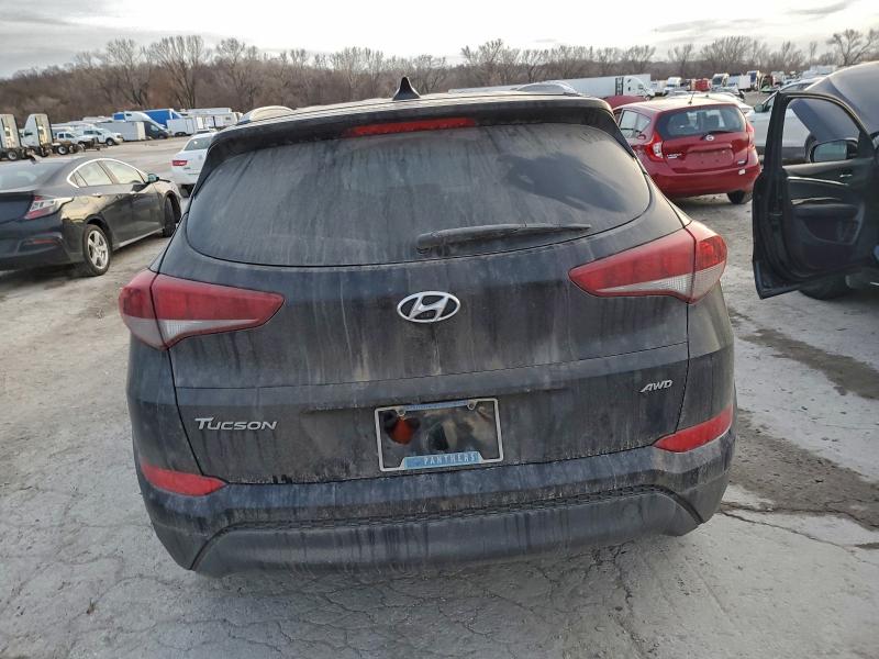 Photo 6 from auction – 2018 HYUNDAI TUCSON SEL with VIN KM8J3CA41JU674632