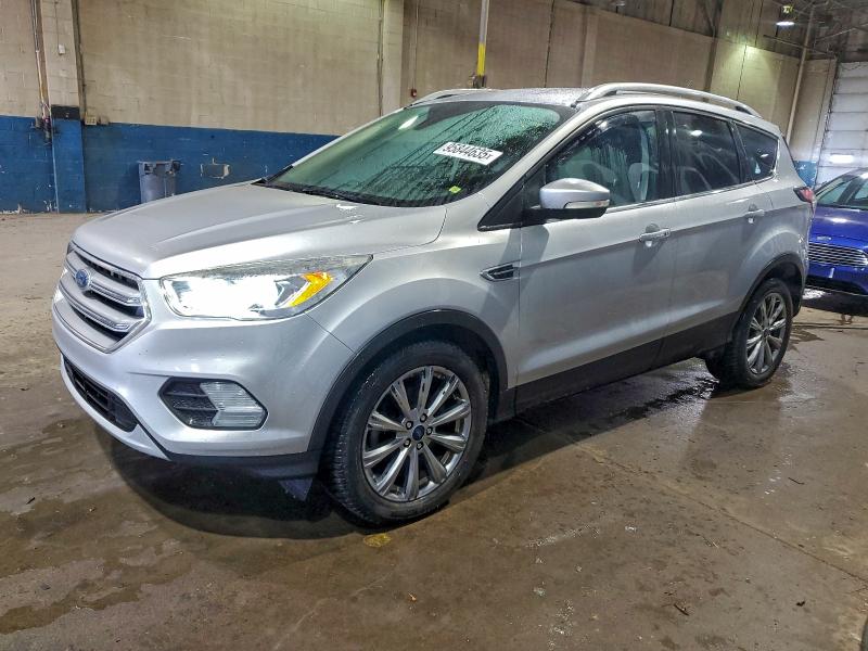 FORD ESCAPE TIT 2017 with VIN 1FMCU0JDXHUE05222 - Photo from auction