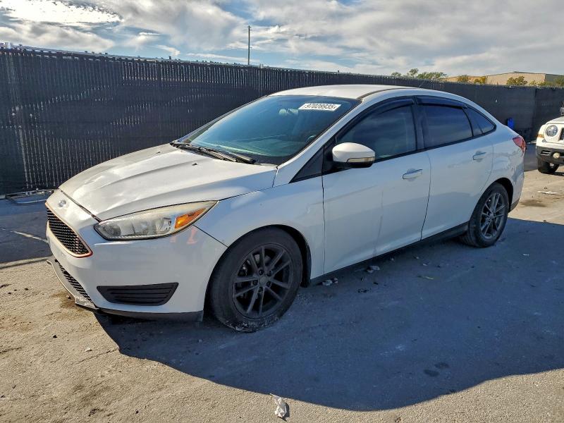 FORD FOCUS SE 2017 with VIN 1FADP3F28HL338401 - Photo from auction