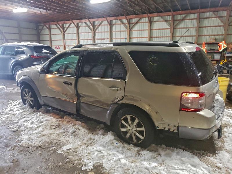 Photo 2 from auction – 2009 FORD TAURUS X S with VIN 1FMDK02W49GA06087