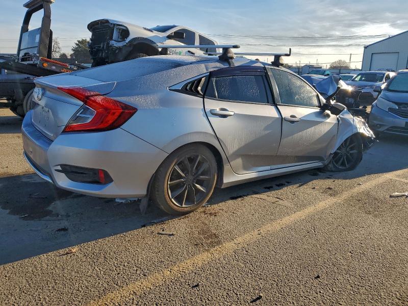 Photo 3 from auction – 2019 HONDA CIVIC LX with VIN 2HGFC2F60KH559198