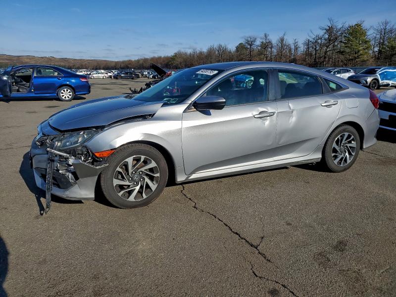 HONDA CIVIC EX 2017 with VIN 2HGFC2F72HH570267 - Photo from auction
