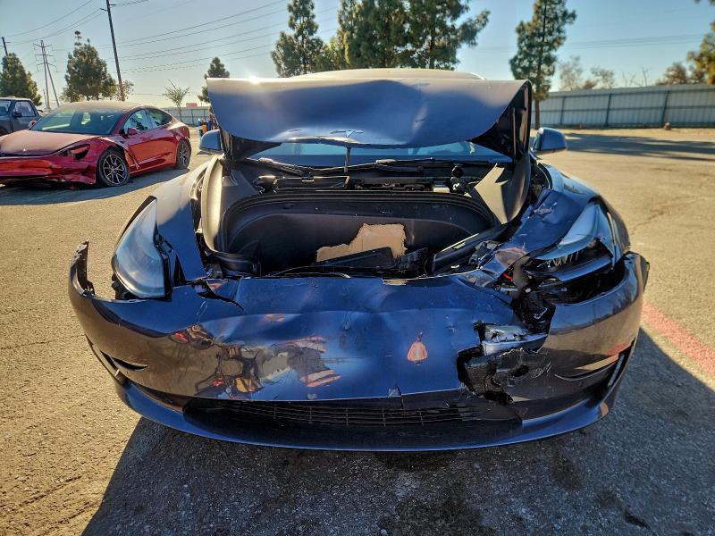 Photo 5 from auction – 2022 TESLA MODEL 3 with VIN 5YJ3E1EA2NF372888