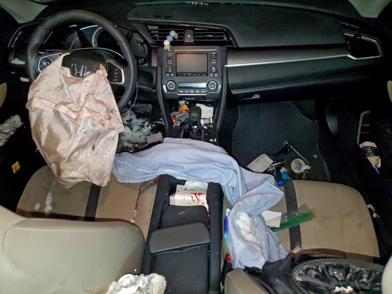 Photo 8 from auction – 2018 HONDA CIVIC with VIN 19XFC2F57JE024448
