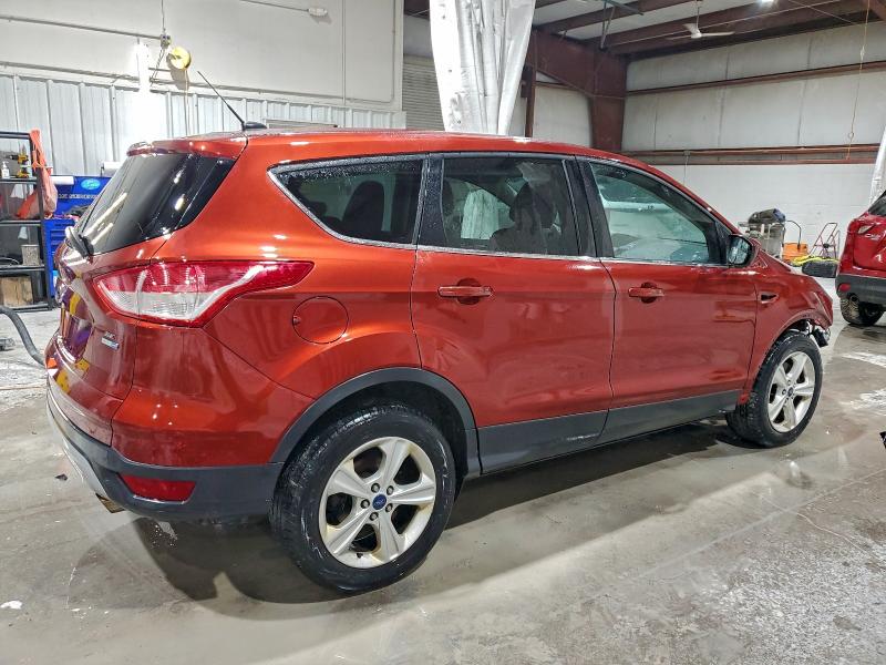 Photo 3 from auction – 2016 FORD ESCAPE SE with VIN 1FMCU9GX2GUA41883