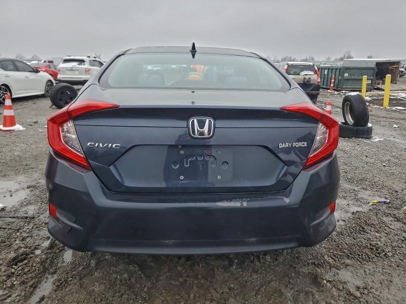 Photo 6 from auction – 2018 HONDA CIVIC EX with VIN 19XFC2F77JE007439