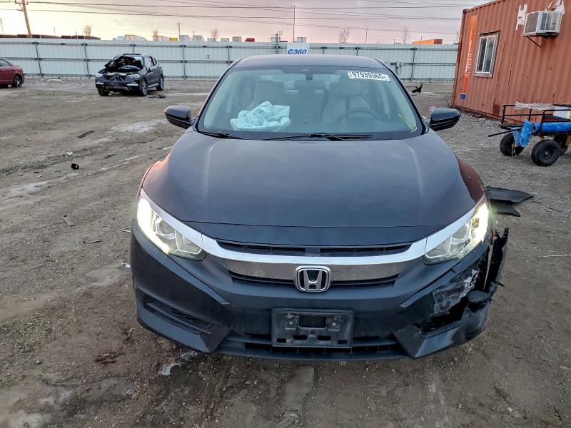Photo 5 from auction – 2017 HONDA CIVIC LX with VIN 19XFC2F52HE029244