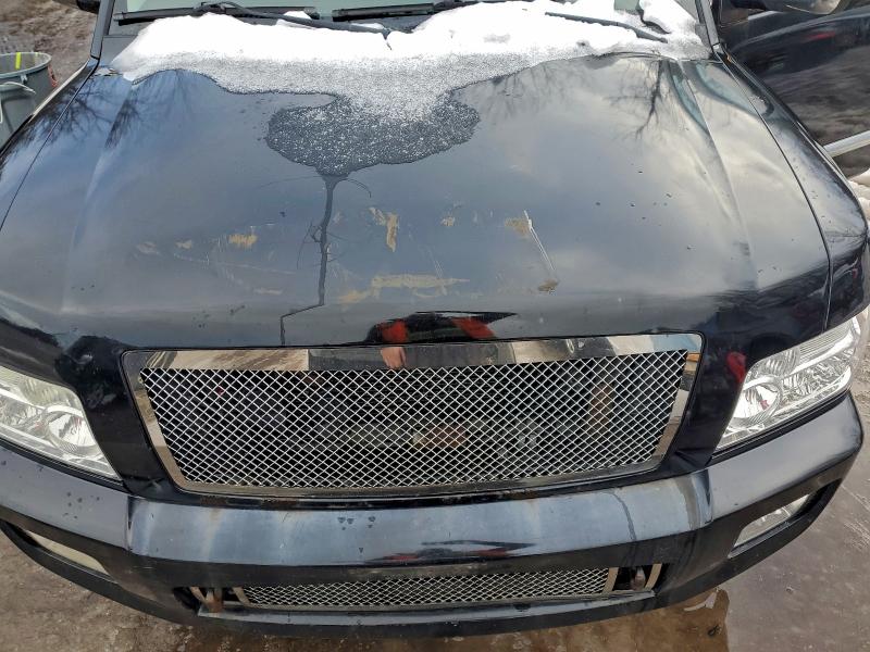 Photo 12 from auction – 2004 INFINITI QX56 with VIN 5N3AA08C64N811698