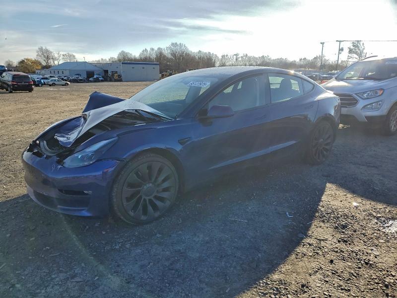 TESLA MODEL 3 2023 with VIN 5YJ3E1EC8PF465452 - Photo from auction